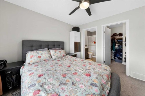 11 Nolan Hill Boulevard Nw, Calgary, AB - Indoor Photo Showing Bedroom