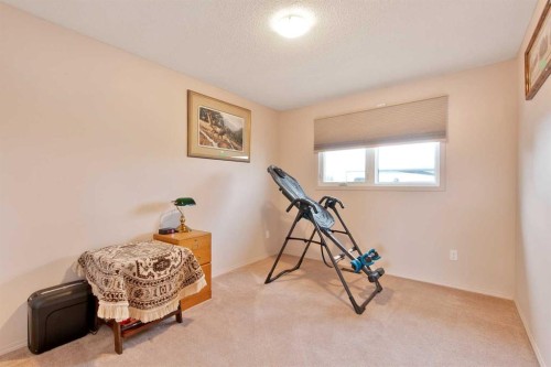 127 Edey Close, Cremona, AB - Indoor Photo Showing Other Room