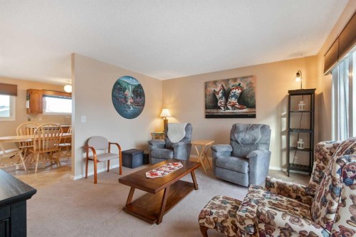 127 Edey Close, Cremona, AB - Indoor Photo Showing Living Room