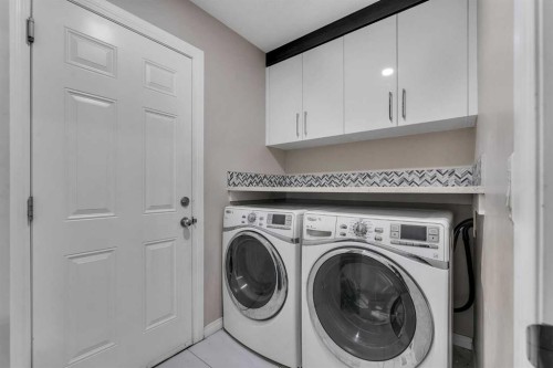 228 Covemeadow Court Ne, Calgary, AB - Indoor Photo Showing Laundry Room