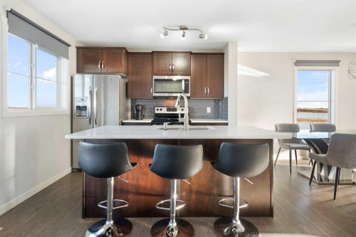 325 Copperpond Landing Se, Calgary, AB - Indoor Photo Showing Kitchen With Stainless Steel Kitchen