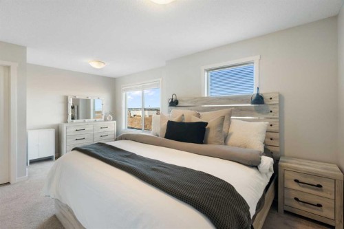 325 Copperpond Landing Se, Calgary, AB - Indoor Photo Showing Bedroom