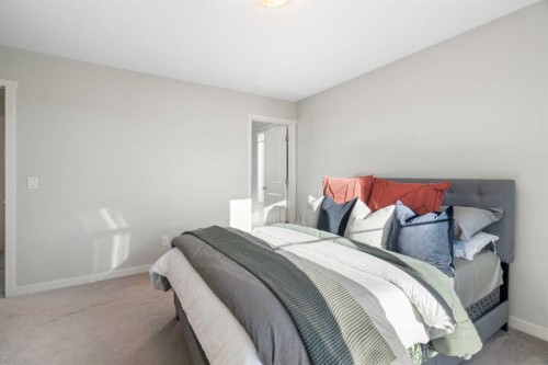 325 Copperpond Landing Se, Calgary, AB - Indoor Photo Showing Bedroom