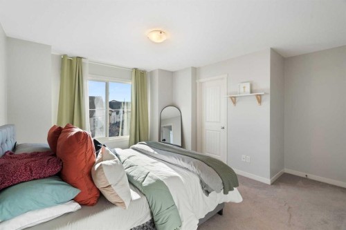 325 Copperpond Landing Se, Calgary, AB - Indoor Photo Showing Bedroom