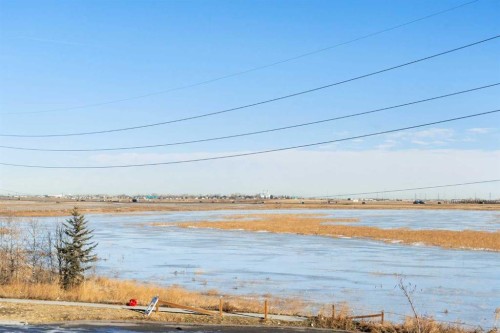 325 Copperpond Landing Se, Calgary, AB - Outdoor With Body Of Water With View