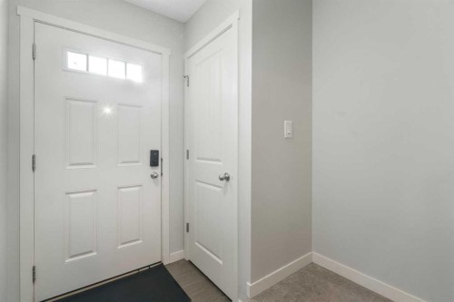 325 Copperpond Landing Se, Calgary, AB - Indoor Photo Showing Other Room