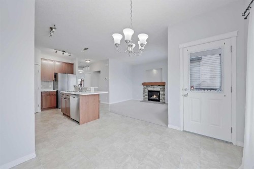102 Kincora Glen Mews Nw, Calgary, AB - Indoor Photo Showing Other Room With Fireplace