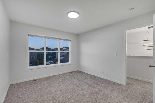 117 Cornerbrook Road Ne, Calgary, AB - Indoor Photo Showing Other Room