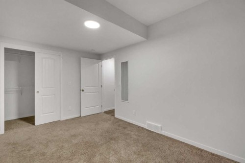 117 Cornerbrook Road Ne, Calgary, AB - Indoor Photo Showing Other Room