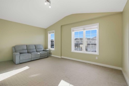 227 Panamount Circle Nw, Calgary, AB - Indoor Photo Showing Living Room