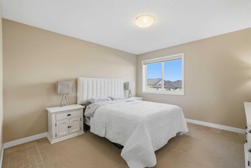227 Panamount Circle Nw, Calgary, AB - Indoor Photo Showing Bedroom