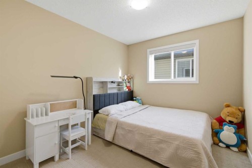 227 Panamount Circle Nw, Calgary, AB - Indoor Photo Showing Bedroom