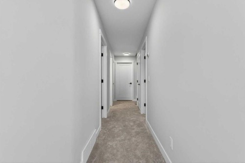 298 Kinniburgh Loop, Chestermere, AB - Indoor Photo Showing Other Room