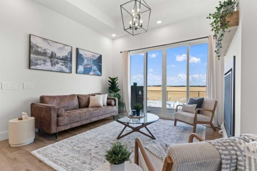 79 Sandpiper Bend, Chestermere, AB - Indoor Photo Showing Living Room