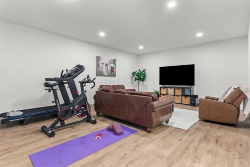 79 Sandpiper Bend, Chestermere, AB - Indoor Photo Showing Gym Room