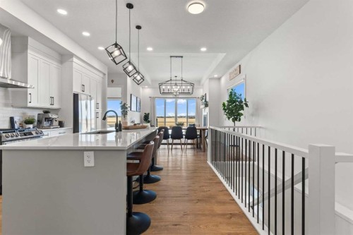 79 Sandpiper Bend, Chestermere, AB - Indoor Photo Showing Kitchen With Upgraded Kitchen