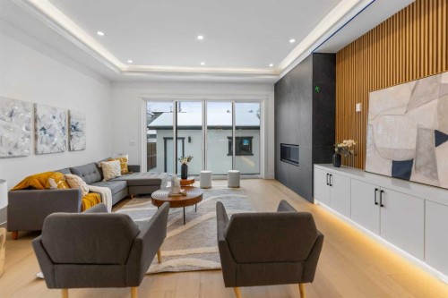 2323 53 Avenue Sw, Calgary, AB - Indoor Photo Showing Living Room