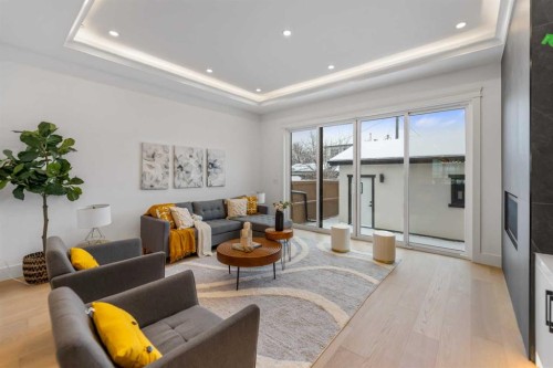 2323 53 Avenue Sw, Calgary, AB - Indoor Photo Showing Living Room