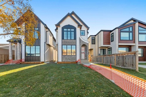 2323 53 Avenue Sw, Calgary, AB - Outdoor With Facade