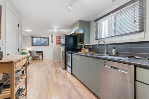 7132 36 Avenue Nw, Calgary, AB - Indoor Photo Showing Kitchen With Double Sink