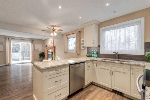 3 Hawkcliff Way Nw, Calgary, AB - Indoor Photo Showing Kitchen With Upgraded Kitchen