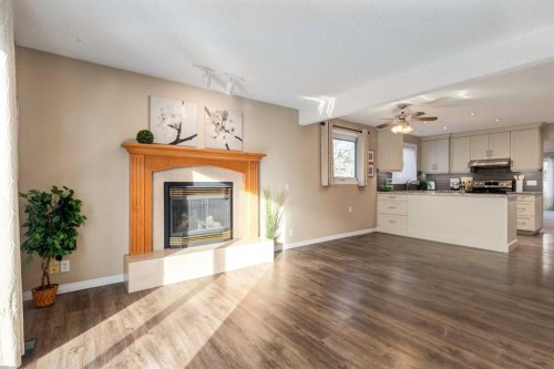 3 Hawkcliff Way Nw, Calgary, AB - Indoor With Fireplace