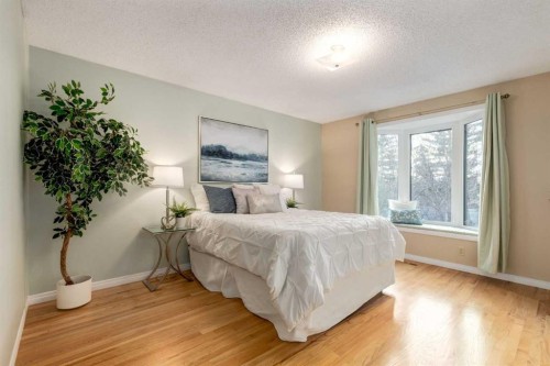 3 Hawkcliff Way Nw, Calgary, AB - Indoor Photo Showing Bedroom