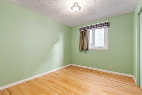 3 Hawkcliff Way Nw, Calgary, AB - Indoor Photo Showing Other Room