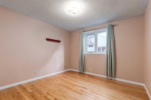 3 Hawkcliff Way Nw, Calgary, AB - Indoor Photo Showing Other Room