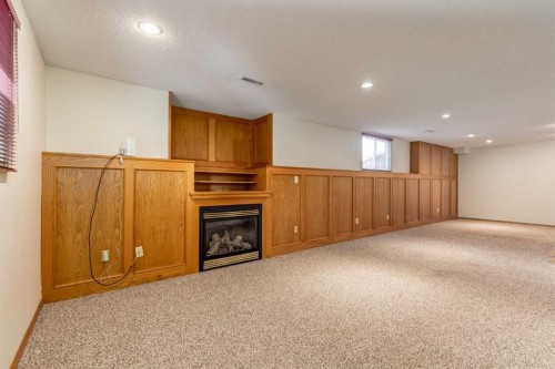 3 Hawkcliff Way Nw, Calgary, AB - Indoor With Fireplace