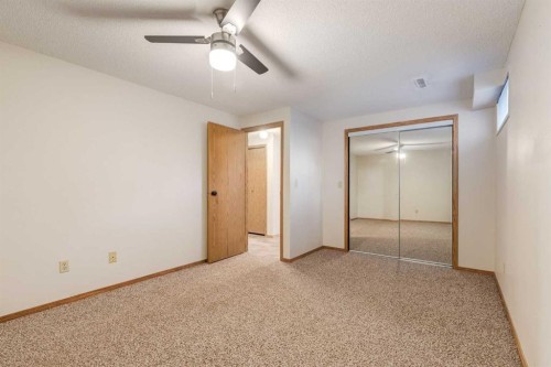 3 Hawkcliff Way Nw, Calgary, AB - Indoor Photo Showing Other Room