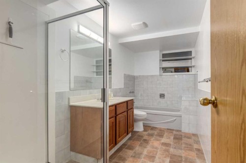 3 Hawkcliff Way Nw, Calgary, AB - Indoor Photo Showing Bathroom