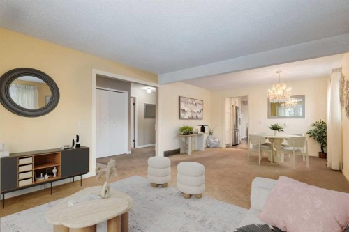 3 Hawkcliff Way Nw, Calgary, AB - Indoor Photo Showing Living Room