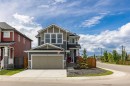 79 Sunrise Way, Cochrane, AB  - Outdoor With Facade 