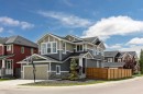79 Sunrise Way, Cochrane, AB  - Outdoor With Facade 