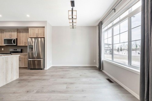 369 D'Arcy Ranch Drive, Okotoks, AB - Indoor Photo Showing Kitchen With Stainless Steel Kitchen