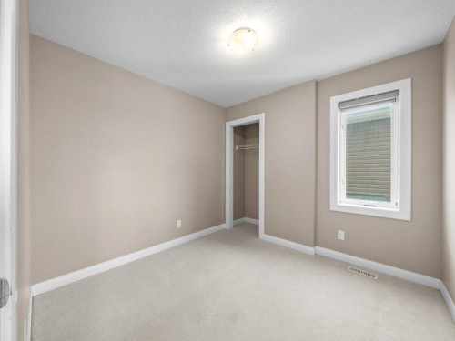 1023 Evanston Drive Nw, Calgary, AB - Indoor Photo Showing Other Room