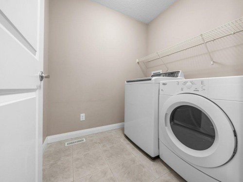 1023 Evanston Drive Nw, Calgary, AB - Indoor Photo Showing Laundry Room