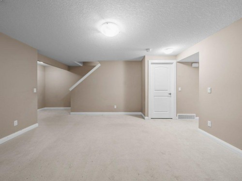 1023 Evanston Drive Nw, Calgary, AB - Indoor Photo Showing Other Room