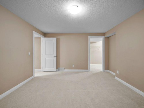 1023 Evanston Drive Nw, Calgary, AB - Indoor Photo Showing Other Room