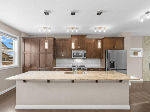 1023 Evanston Drive Nw, Calgary, AB - Indoor Photo Showing Kitchen With Stainless Steel Kitchen With Upgraded Kitchen