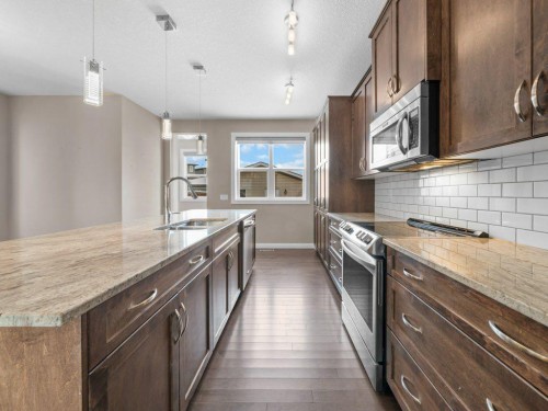 1023 Evanston Drive Nw, Calgary, AB - Indoor Photo Showing Kitchen With Upgraded Kitchen
