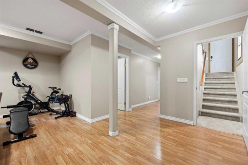 306 Coventry Road Ne, Calgary, AB - Indoor Photo Showing Gym Room