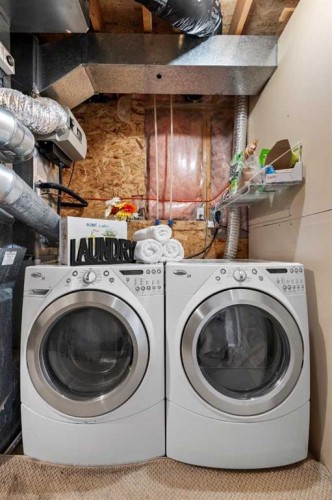 306 Coventry Road Ne, Calgary, AB - Indoor Photo Showing Laundry Room