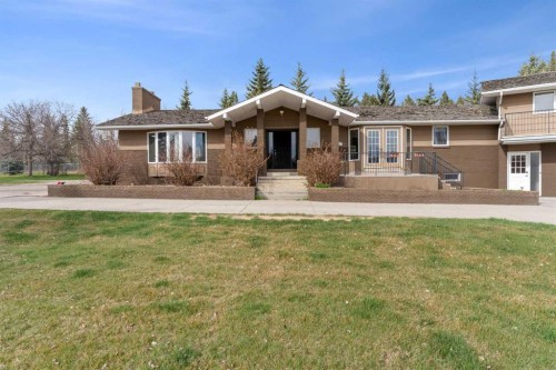 1008 Shawnee Drive Sw, Calgary, AB - Outdoor With Facade