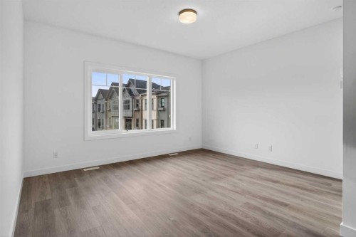 140-2231 81St Street Sw, Calgary, AB - Indoor Photo Showing Other Room