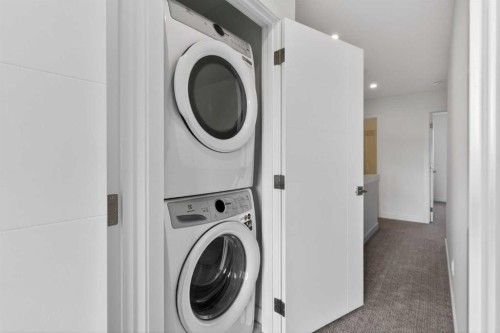 140-2231 81St Street Sw, Calgary, AB - Indoor Photo Showing Laundry Room