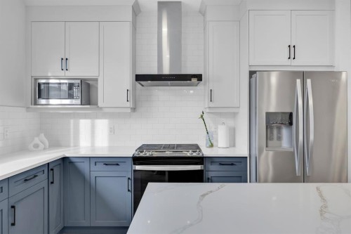 153 Edith Way Nw, Calgary, AB - Indoor Photo Showing Kitchen With Stainless Steel Kitchen With Upgraded Kitchen