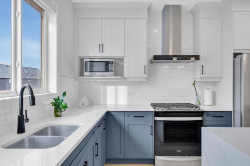 153 Edith Way Nw, Calgary, AB - Indoor Photo Showing Kitchen With Stainless Steel Kitchen With Double Sink With Upgraded Kitchen