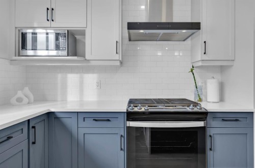153 Edith Way Nw, Calgary, AB - Indoor Photo Showing Kitchen With Upgraded Kitchen